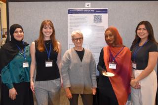Computer science researchers Maleehah Africawala '25, Megan McNamara '25, Professor Nanette Veilleux, Fayza Beshir '25, and Emily Douglas '25 worked together for a Faculty-Student Collaborative Fellowship.