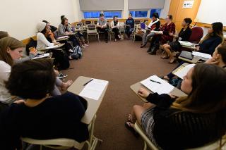 Students sitting in the round in a classroom