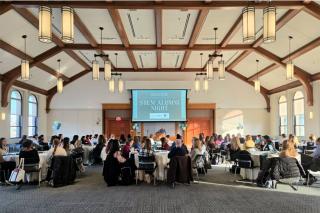 A room full of Simmons students, alumni, and faculty during STEM alumni night