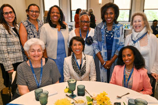 President Lynn Perry Wooten and Provost Stephanie Cosner with a group of alumnae/i at Reunion 2025