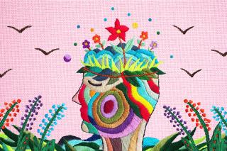 A colorful piece of art representing a profile of a face