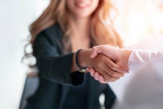 Two people shaking hands