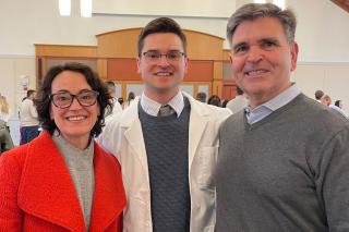 Louis Izzi and his parents at the White Coat Ceremony held by the Department of Physical Therapy at the end of student's first year.