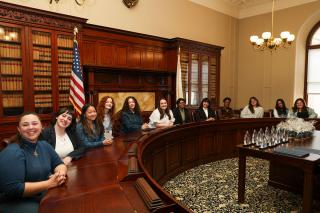 Barbara Lee Fellows celebrate at the State House on April 29, photograph by Bella Yee '24.