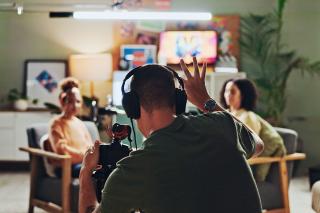 A team of people working on a podcast
