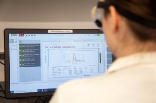 A student evaluating chemistry research on a computer. Photo by Ashley Purvis.