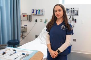 Jordan Monette ’27MSN, ’28DNP in the Nursing Simulation Lab at Simmons