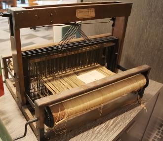 One of John Simmons’ surviving looms, courtesy of Simmons University Archives, video still by Ashley Purvis.