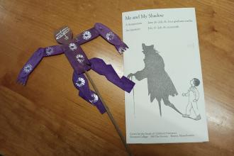 Brochure coverand puppet from the Summer Children's Institute titled "Me and My Shadow"