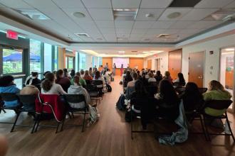 Simmons students at a talk by Jackie Townsend, Program Manager for Astrophysics Strategic Missions Program for NASA's Goddard Space Flight Center