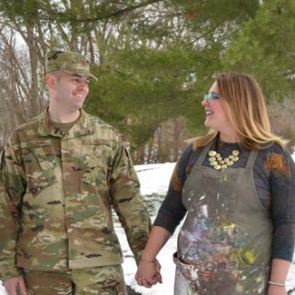 Photo of Anne Villano and husband holding hands