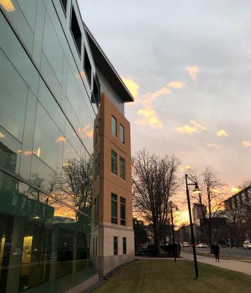 The outside of the Simmons Library at sunset