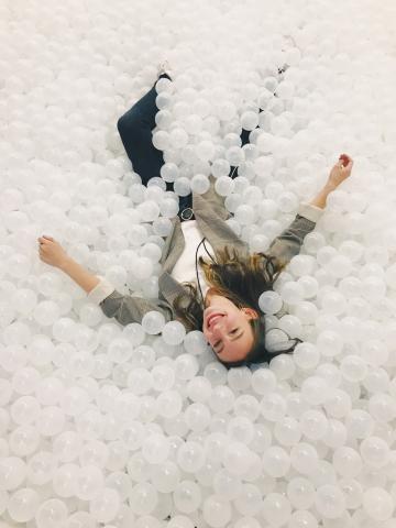 Lauren Kaye in a ball pit at INBOUND