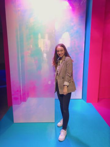 Lauren Kaye posing with art at INBOUND