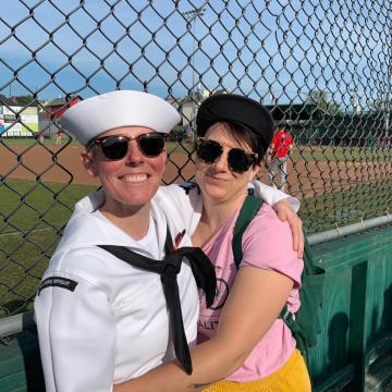 Vin Sowders in Navy whites at baseball game.