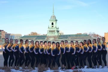 Simmons Gymnastics with cupola in the background.