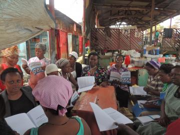 Diana with her womens group discussing content from OBOS translation.