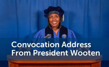 President Wooten standing at a podium at Convocation. The text reads Convocation Address from President Wooten.