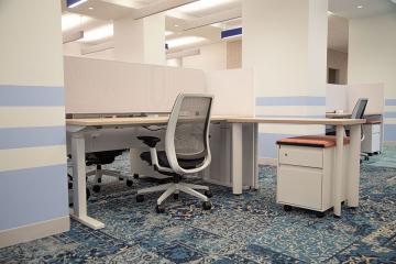 Desks in the One Stop at Simmons University