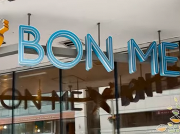 The hanging Bon Me sign in front of the restaurant in Boston