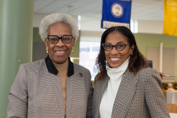 Two alums enjoying Alumnae, Family, and Friends Weekend