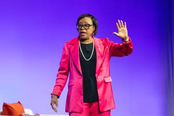 Cynthia "Cynt" Marshall delivers a keynote at SLC25, Jill Person Photography.