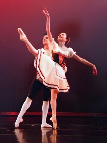 Amanda Michel ’23, ’25DPT and Anderson Lima perform the “Peasant Pas de Deux” from the ballet Giselle, photograph by Cynthia Hrones