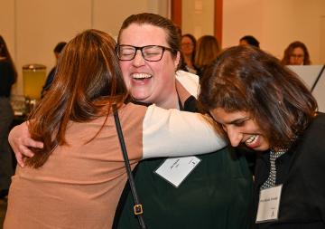 ECONnect 2025: Alums Hugging