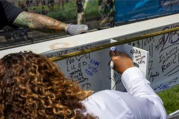 The final beam was signed by many members of the community