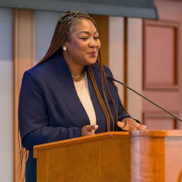 Dr. Rachel Deleveaux speaking at the 2026 MLK breakfast