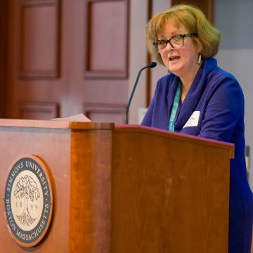 Claire Ramsbottom, COF executive director, speaking at the 2026 MLK breakfast