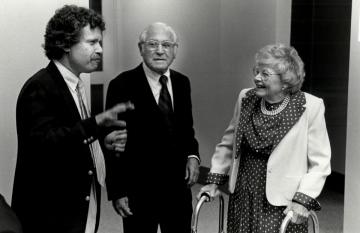 Bob Oppenheim, posed chatting with Benjamin A. and Julia Meyerson Trustman '24. circa 1975, Simmons University Archival Photograph Collection 001