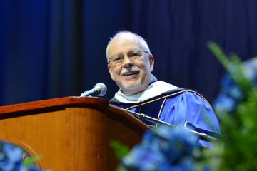 Gregory Maquire ’78MA speaking at the 2026 Simmons University Commencement Ceremony