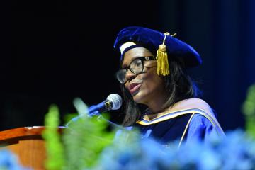 Simmons President Lynn Perry Wooten speaking at the 2026 Commencement ceremony
