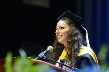 One of the student speakers at the 2026 Commencement ceremony. Photo credit: Ivana Lucero, Grad Images.