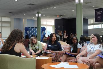 Orientation 2026 - Group sitting together in Common Grounds area