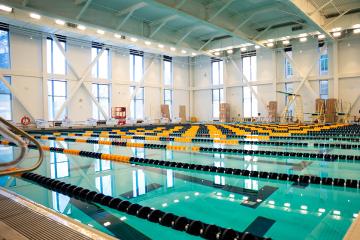 A view from the pool deck of the diving boards at the far end of the Simmons pool.