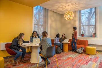 Students gathered in the Ifill college common area