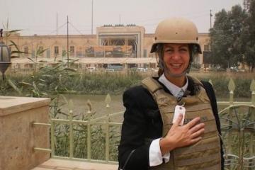 Caryn Anderson en route to training public librarians in Diwaniyah, Iraq, 2010