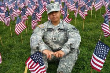 Sharalis planting U.S. flags at the Boston Common during the weekend of Memorial Day.