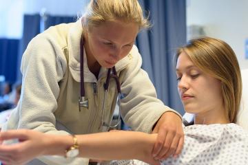 Students in a nursing simulation lab