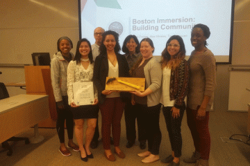 Azeb Freitas ’17, Alex Mireles ’17, and Trang Nguyen ’18 at their capstone presentation with Community Engagement staff.