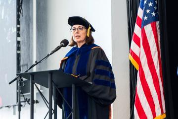 Interim Dean of COCIS Sanda Erdelez at Commencement 2022