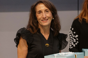 Linda Siperstein Adler ’73 seated at a table during her 50th class reunion