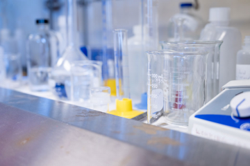 A table full of beakers and test tubes in the Simmons University nursing lab