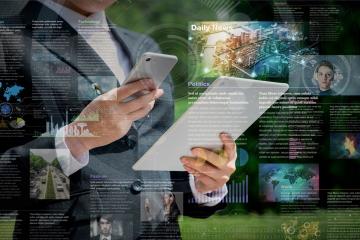 A person with a phone and a tablet, with overlays of articles across the image