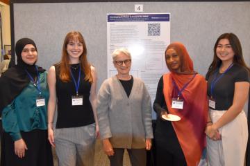 Computer science researchers Maleehah Africawala '25, Megan McNamara '25, Professor Nanette Veilleux, Fayza Beshir '25, and Emily Douglas '25 worked together for a Faculty-Student Collaborative Fellowship.