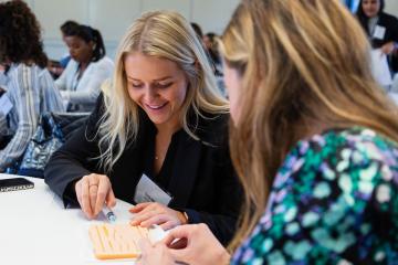 Simmons nursing students engaging in a hands-on project during Immersion weekend