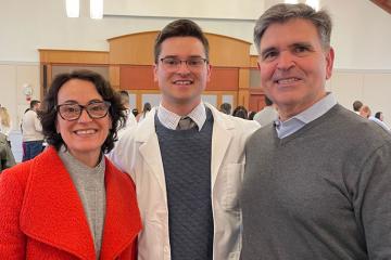 Louis Izzi and his parents at the White Coat Ceremony held by the Department of Physical Therapy at the end of student's first year.