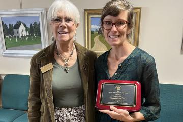 Brittany Durgin '17MS, pictured with New Hampshire Library Trustees Association board member Ann Xavier, receives the Library Director of the Year Award 